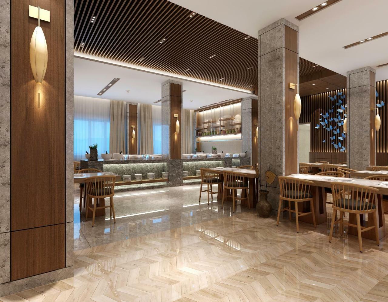 Sanya New City Hotel Extérieur photo